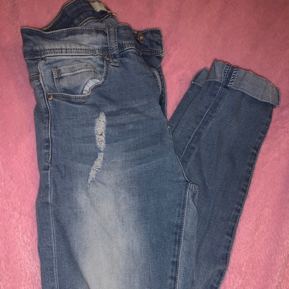 cuffed ripped jeans
